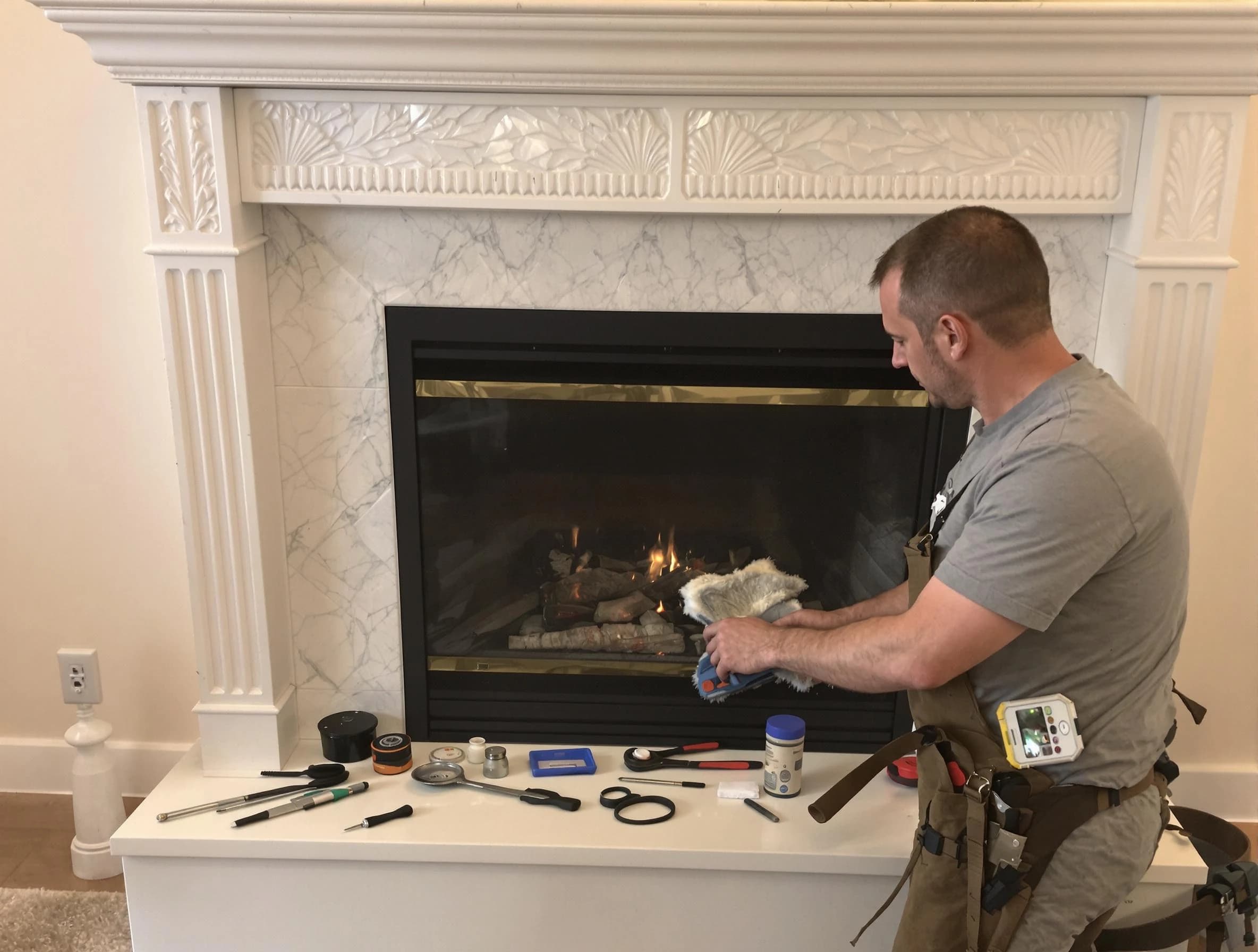 Somerville Chimney Sweep performing fireplace maintenance in Somerville, MA